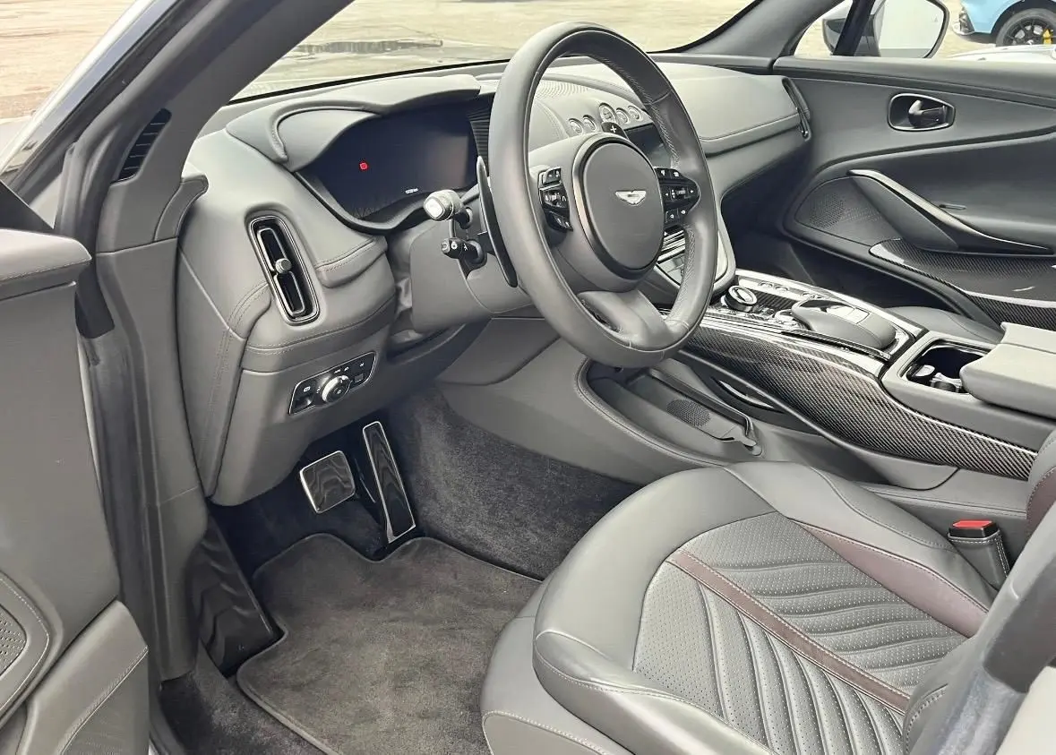 Aston Martin DBX 707 2026, exterior — Venice Lux Car Rental, Venice. The DBX 707 pairs a 707 hp V8 with genuine five-seat comfort, an SUV built to carry both…