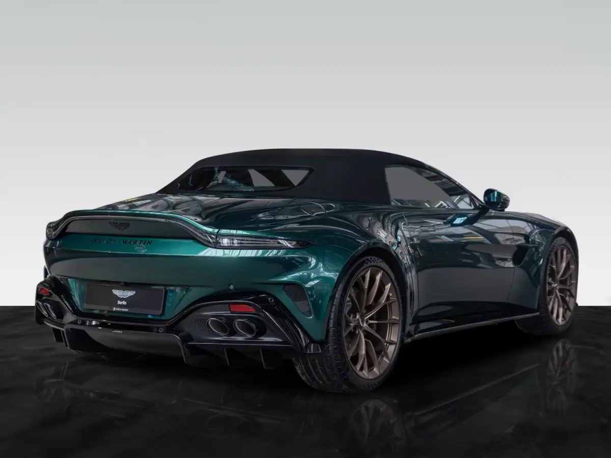 Aston Martin Vantage V8 Spider 2026, rear view — Venice Lux Car Rental, Venice. The 2026 Aston Martin Vantage V8 Spider pairs 665 hp with a roof that drops in seconds,…
