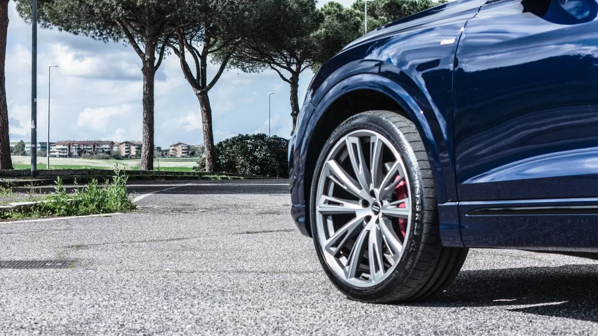 Audi Q8 55 TFSI 2022, rear view — Venice Lux Car Rental, Venice. The Audi Q8 55 TFSI carries its 340 hp with the kind of quiet confidence that suits a…