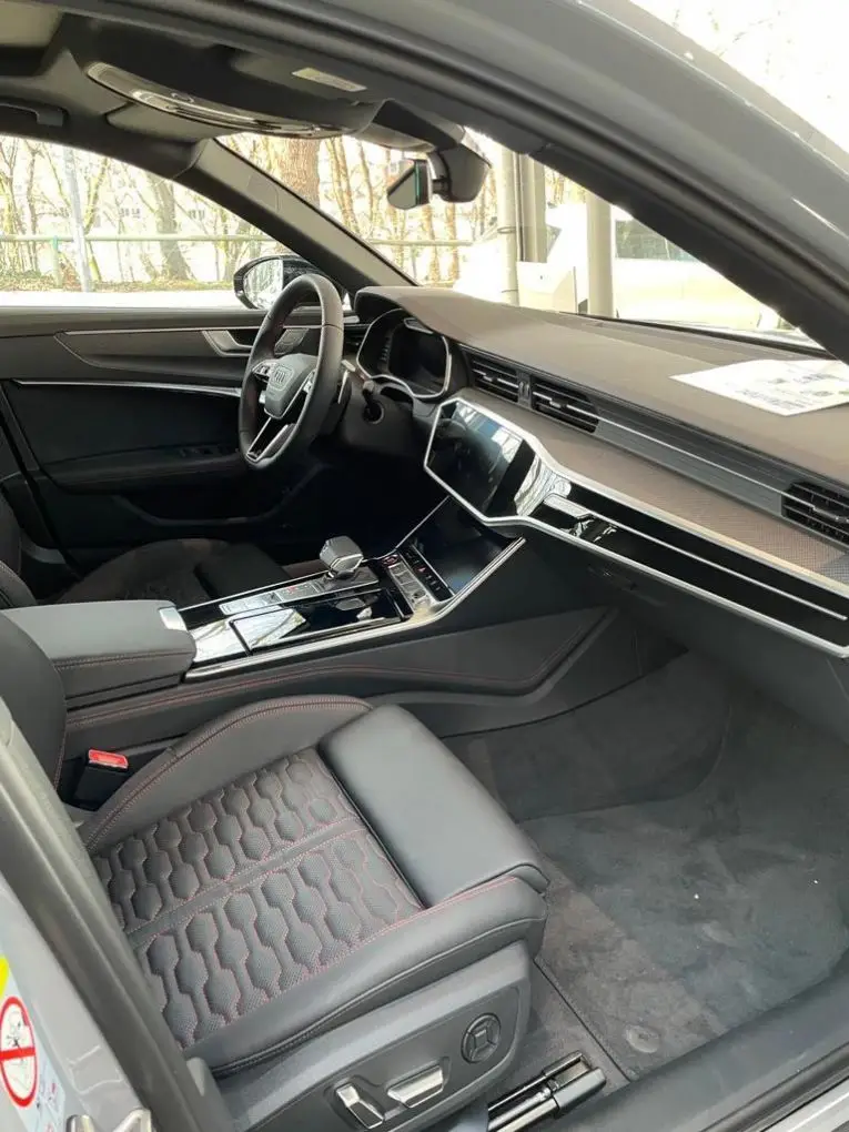 Audi RS6 Dynamic 2023, rear view — Venice Lux Car Rental, Venice. The Audi RS6 Dynamic pairs wagon-body practicality with a genuinely serious drivetrain:…
