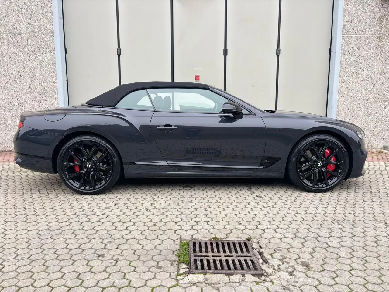 Bentley Continental GTC S V8 2025, rear view — Venice Lux Car Rental, Venice. The Bentley Continental GTC S V8 is built for covering distance in comfort, not for…