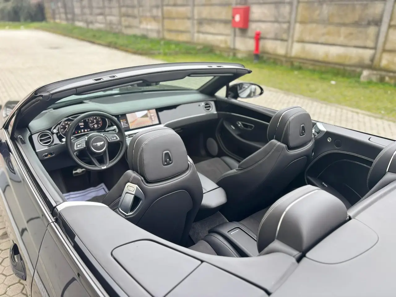 Bentley Continental GTC S V8 2025, side profile — Venice Lux Car Rental, Venice. The Bentley Continental GTC S V8 is built for covering distance in comfort, not for…