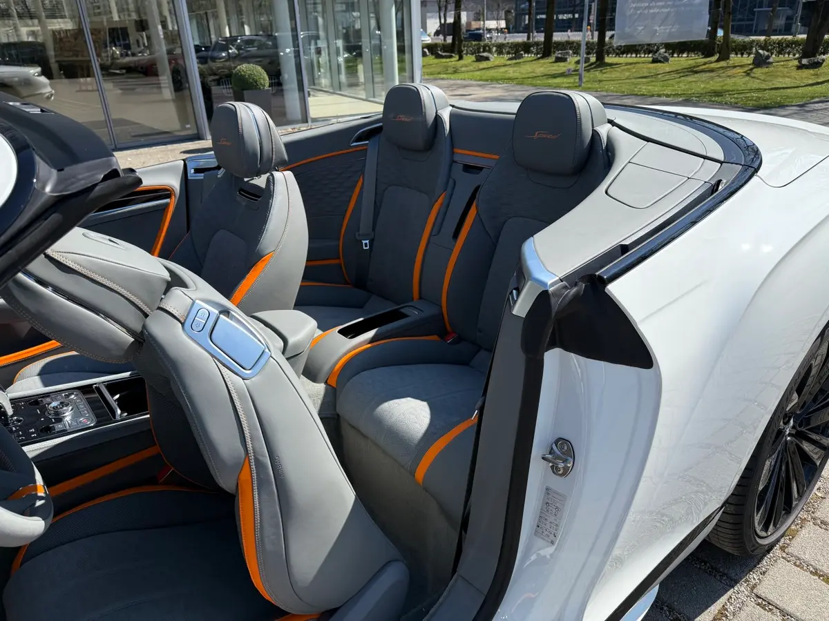 Bentley Continental GTC Speed 2025, rear view — Venice Lux Car Rental, Venice. The 2025 Bentley Continental GTC Speed pairs a 650 hp drivetrain with a four-seat cabin…