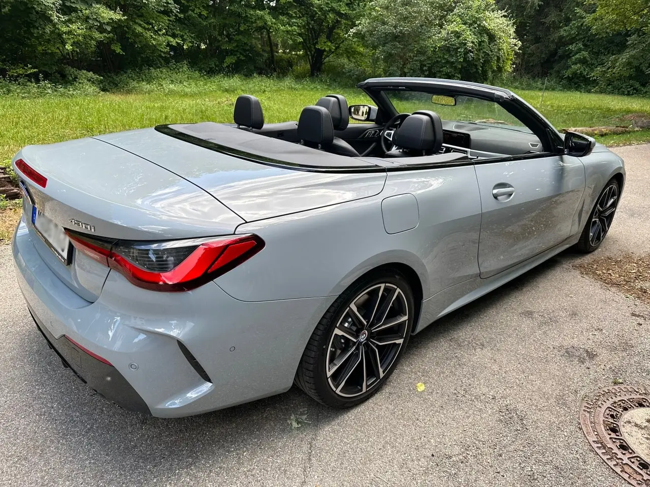 BMW 430i Cabrio 2023, exterior — Venice Lux Car Rental, Venice. The BMW 430i Cabrio pairs a 245 hp turbocharged engine with a folding top, giving it an…