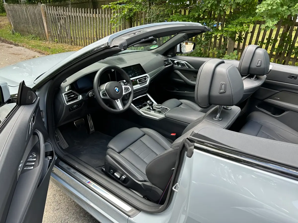 BMW 430i Cabrio 2023, interior — Venice Lux Car Rental, Venice. The BMW 430i Cabrio pairs a 245 hp turbocharged engine with a folding top, giving it an…