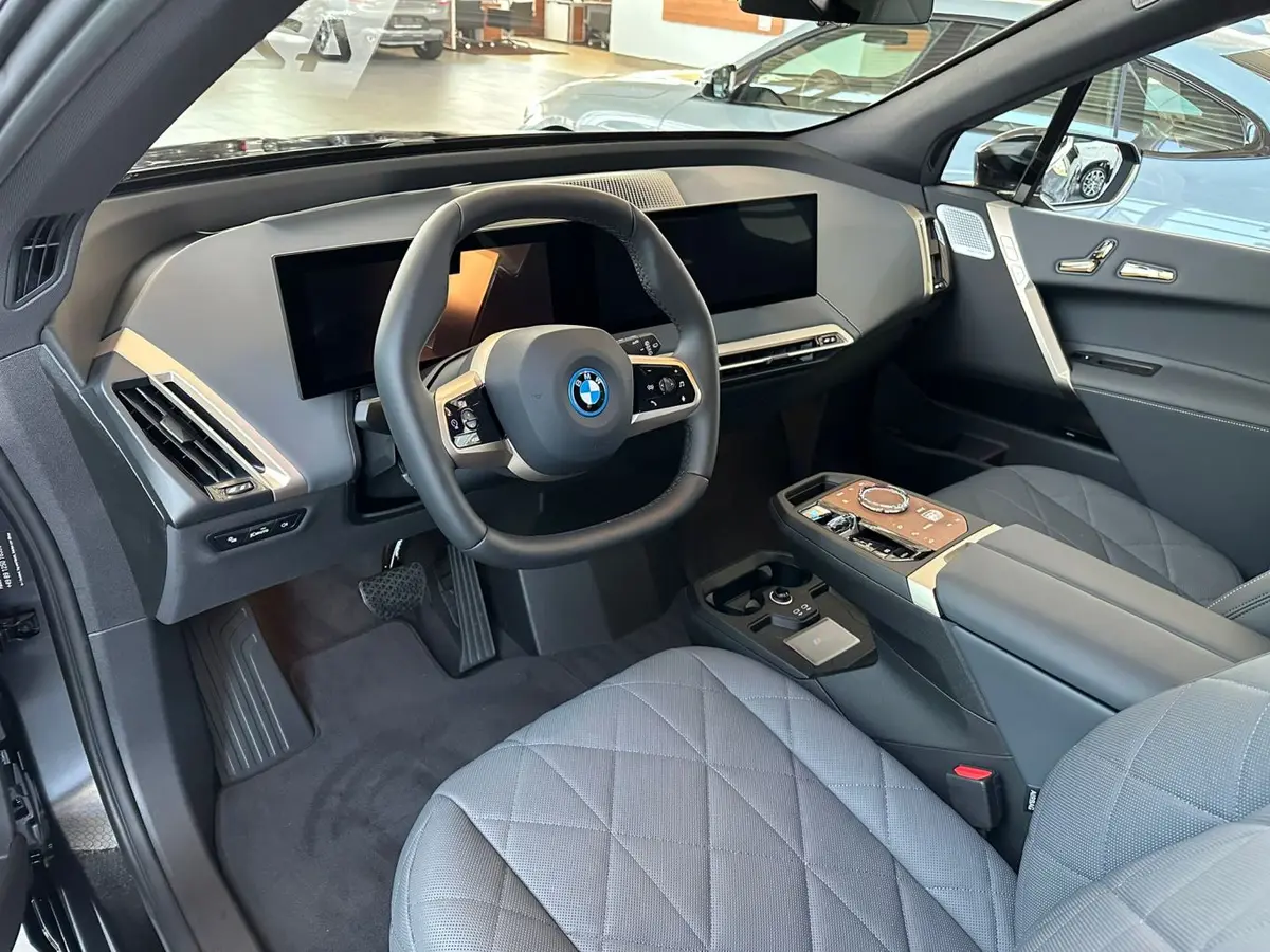 BMW IX M60 2023, exterior — Venice Lux Car Rental, Venice. The BMW iX M60 brings 619 hp into a fully electric SUV body, which means the usual…
