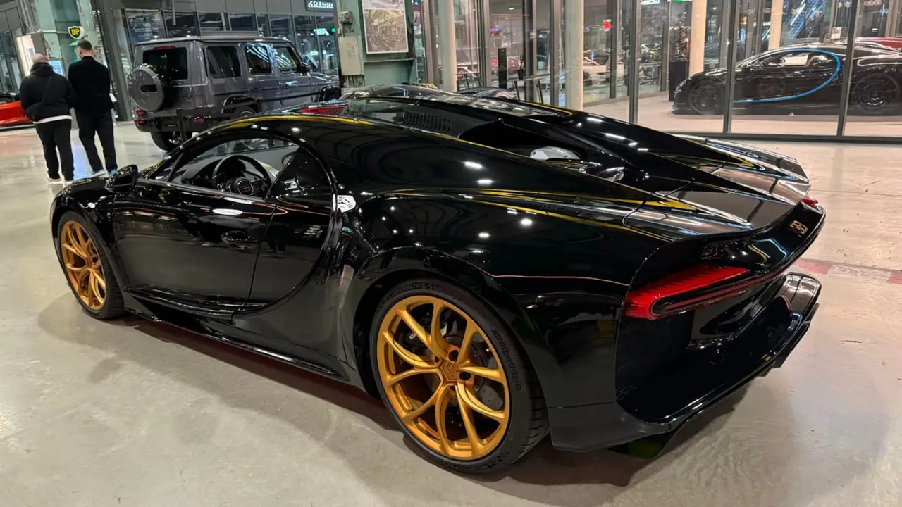 Bugatti Chiron 110 Ani 2019, exterior — Venice Lux Car Rental, Venice. The 2019 Bugatti Chiron 110 Ani carries 1500 hp and four seats inside a supercar body…