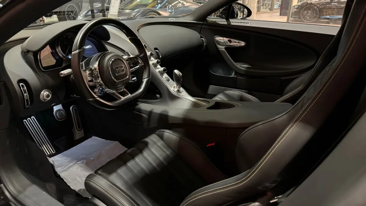 Bugatti Chiron 110 Ani 2019, rear view — Venice Lux Car Rental, Venice. The 2019 Bugatti Chiron 110 Ani carries 1500 hp and four seats inside a supercar body…