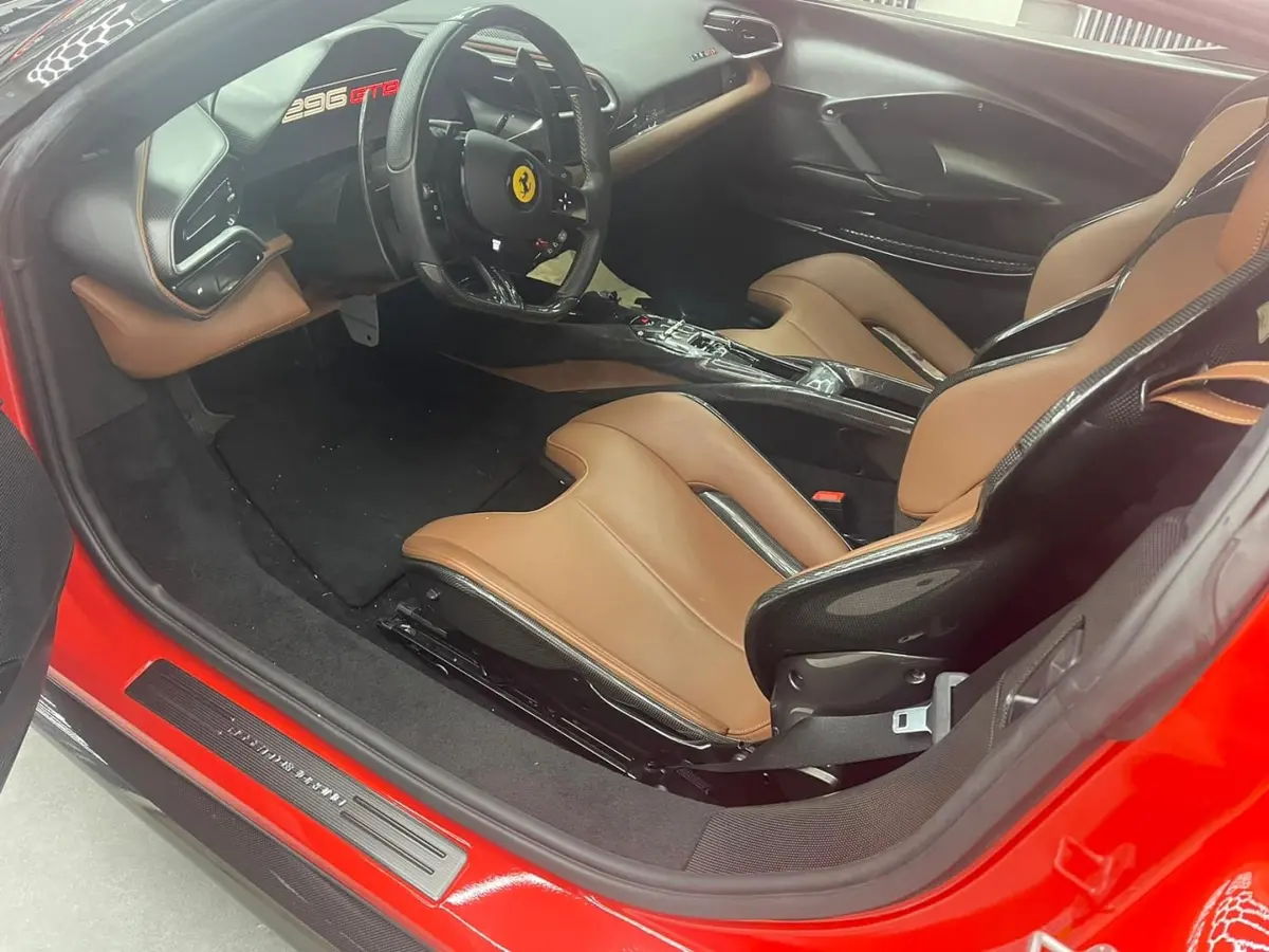 Ferrari 296 GTB 2023, dashboard — Venice Lux Car Rental, Venice. The Ferrari 296 GTB pairs a plug-in hybrid V6 with 830 hp, a combination that delivers…