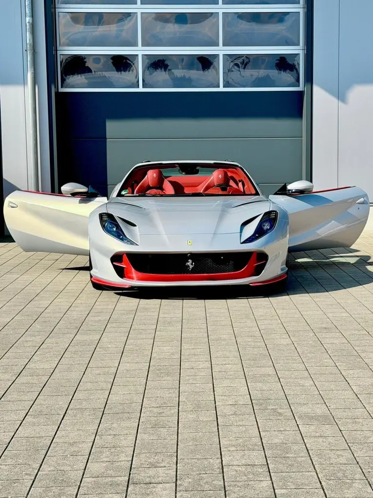 Ferrari 812 GTS 2024, exterior — Venice Lux Car Rental, Venice. The Ferrari 812 GTS pairs a 789 hp naturally aspirated V12 with a folding hard top, a…