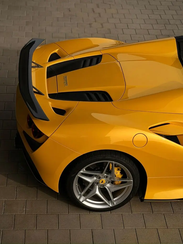 Ferrari F8 SPIDER 2023, exterior — Venice Lux Car Rental, Venice. The Ferrari F8 Spider pairs a 720 hp twin-turbo V8 with a folding hard top, so the…