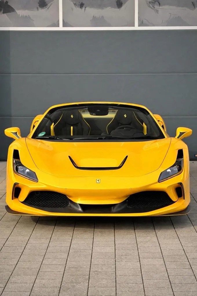 Ferrari F8 SPIDER 2023, rear view — Venice Lux Car Rental, Venice. The Ferrari F8 Spider pairs a 720 hp twin-turbo V8 with a folding hard top, so the…