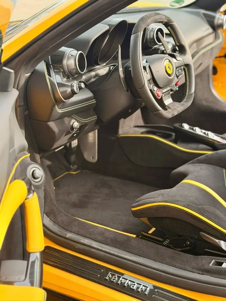 Ferrari F8 SPIDER 2023, interior — Venice Lux Car Rental, Venice. The Ferrari F8 Spider pairs a 720 hp twin-turbo V8 with a folding hard top, so the…