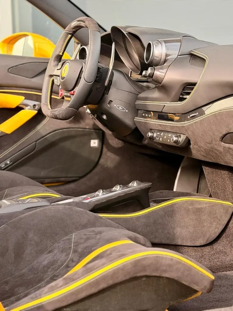 Ferrari F8 SPIDER 2023, dashboard — Venice Lux Car Rental, Venice. The Ferrari F8 Spider pairs a 720 hp twin-turbo V8 with a folding hard top, so the…