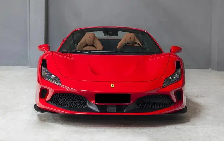 Ferrari F8 Tributo Spider Red 2023, front view — Venice Lux Car Rental, Venice. The Ferrari F8 Tributo Spider pairs a 720 hp V8 with a folding hard top, giving open-air…