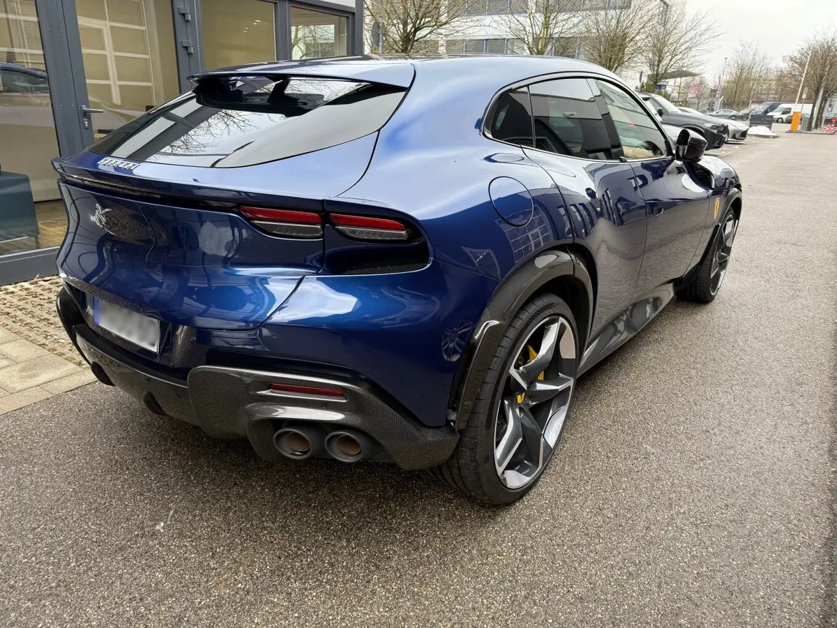 Ferrari Purosangue 2024, exterior — Venice Lux Car Rental, Venice. The Ferrari Purosangue brings something unusual to a supercar rental fleet: five real…