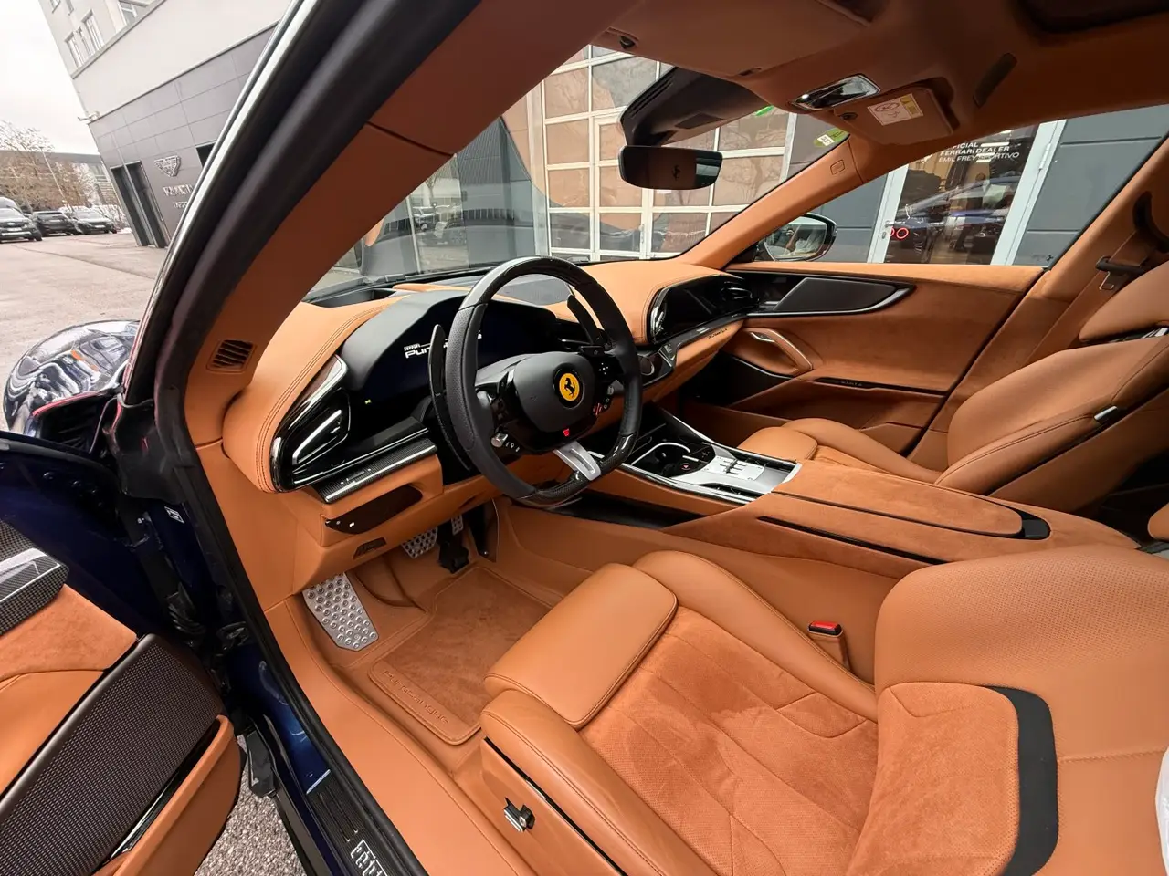Ferrari Purosangue 2024, rear view — Venice Lux Car Rental, Venice. The Ferrari Purosangue brings something unusual to a supercar rental fleet: five real…