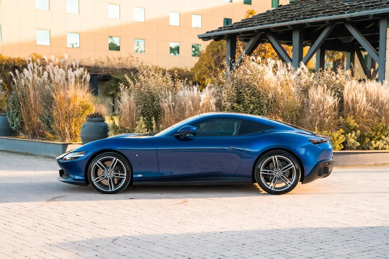 Ferrari Roma 2025, rear view — Venice Lux Car Rental, Venice. The Ferrari Roma reads as a grand tourer rather than a pure track weapon, which is…