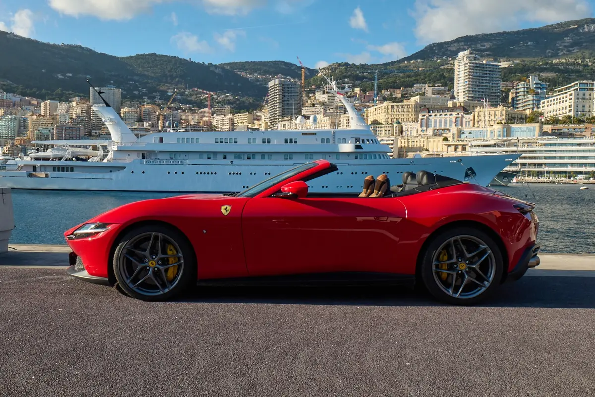 Ferrari Roma Spider 2024, exterior — Venice Lux Car Rental, Venice. The Ferrari Roma Spider pairs 620 hp with a soft-top that drops in seconds, built for…