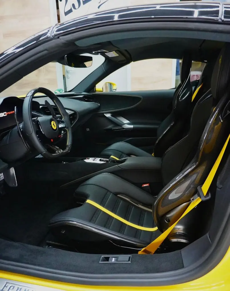 Ferrari SF90 Spider 2024, exterior — Venice Lux Car Rental, Venice. The Ferrari SF90 Spider sits at the top of what a two-seat convertible can do: 986 hp…