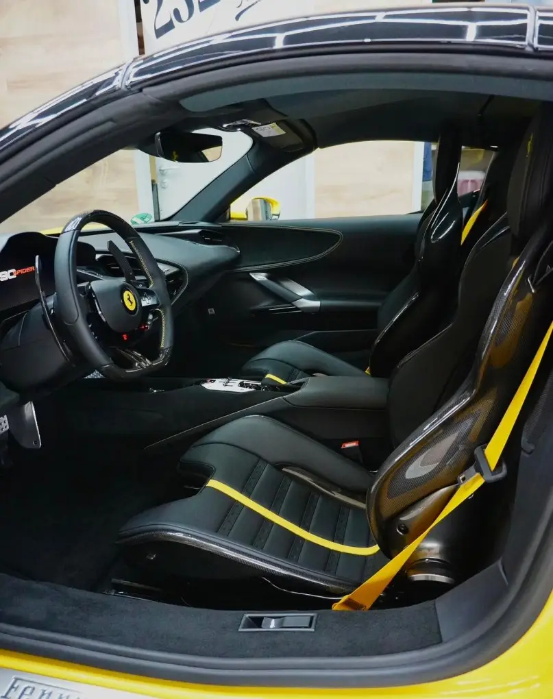 Ferrari SF90 Spider 2024, exterior — Venice Lux Car Rental, Venice. The Ferrari SF90 Spider sits at the top of what a two-seat convertible can do: 986 hp…