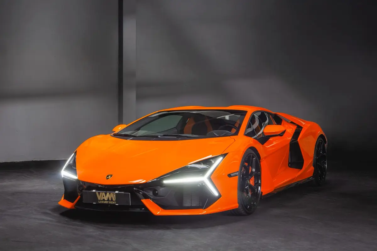 Lamborghini Revuelto 2026, front view — Venice Lux Car Rental, Venice. The Revuelto sits at the top of Lamborghini's current range, a two-seat supercar…