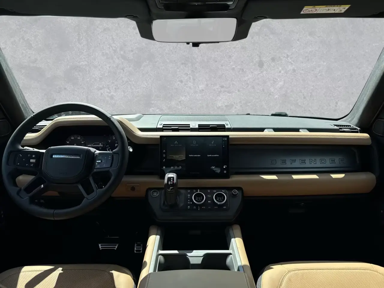Land Rover Defender 2024, rear view — Venice Lux Car Rental, Venice. The 2024 Land Rover Defender pairs a commanding driving position with genuine seven-seat…