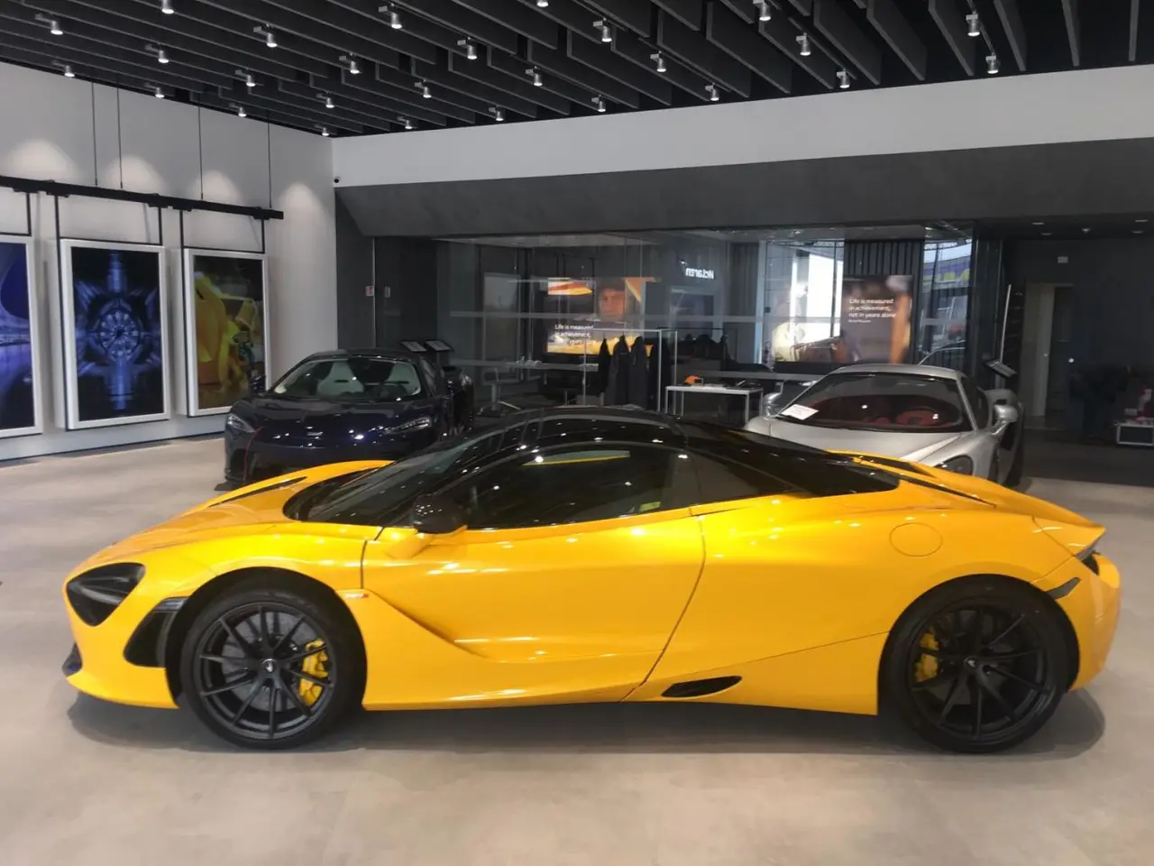 McLaren 720S Spider 2022, rear view — Venice Lux Car Rental, Venice. The McLaren 720S Spider does not ease into speed, it delivers it — 720 hp routed through…