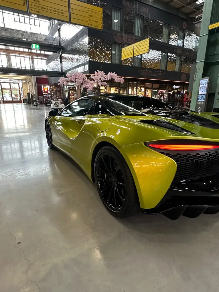 McLaren Artura Spider 2024, exterior — Venice Lux Car Rental, Venice. The McLaren Artura Spider pairs a twin-turbo V6 with electric assistance to produce 671…