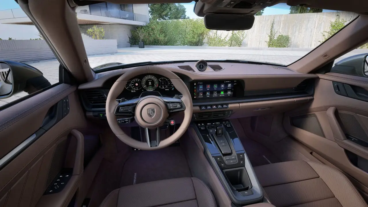 Porsche 911 992 Carrera Turbo S Cabrio 2026, rear view — Venice Lux Car Rental, Venice. The 2026 Porsche 911 992 Carrera Turbo S Cabrio carries 650 hp with the calm confidence…