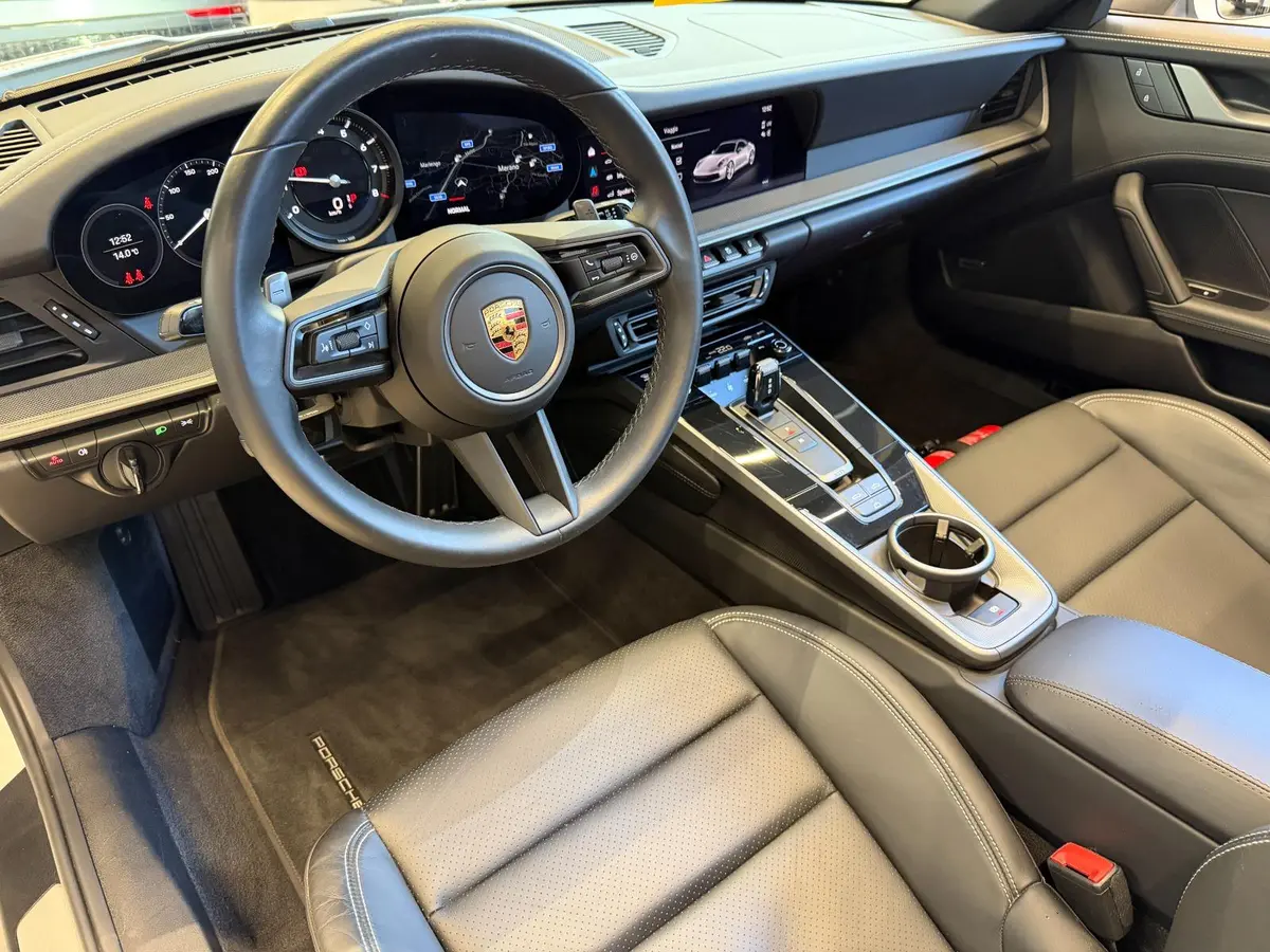 Porsche 911 Carrera S Cabrio (992) 2025, front view — Venice Lux Car Rental, Venice. The 2025 Porsche 911 Carrera S Cabrio (992) is built for drivers who want engagement over…