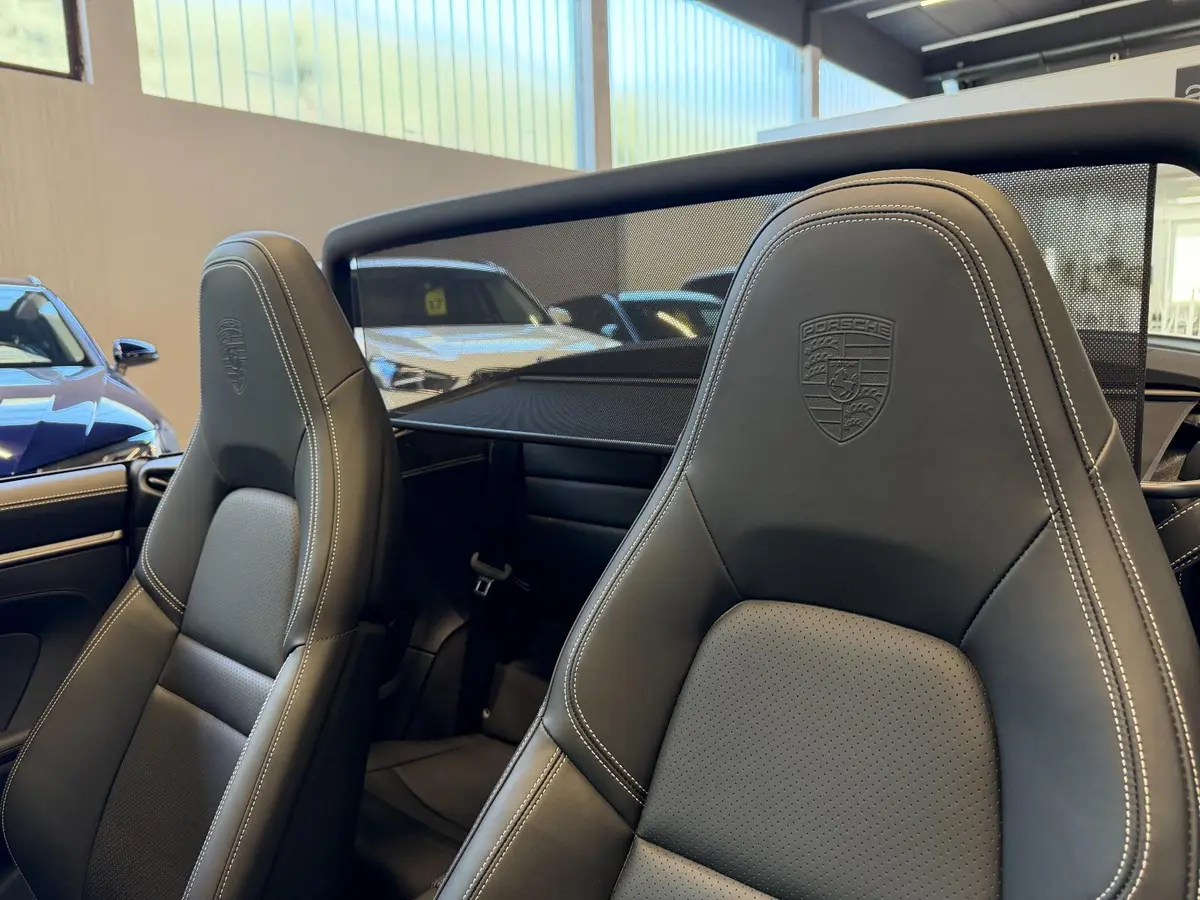 Porsche 911 Carrera S Cabrio (992) 2025, rear view — Venice Lux Car Rental, Venice. The 2025 Porsche 911 Carrera S Cabrio (992) is built for drivers who want engagement over…