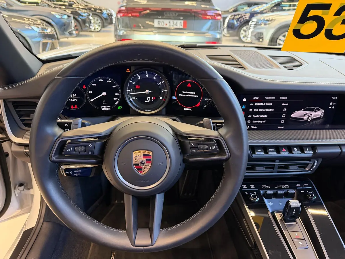 Porsche 911 Carrera S Cabrio (992) 2025, interior — Venice Lux Car Rental, Venice. The 2025 Porsche 911 Carrera S Cabrio (992) is built for drivers who want engagement over…
