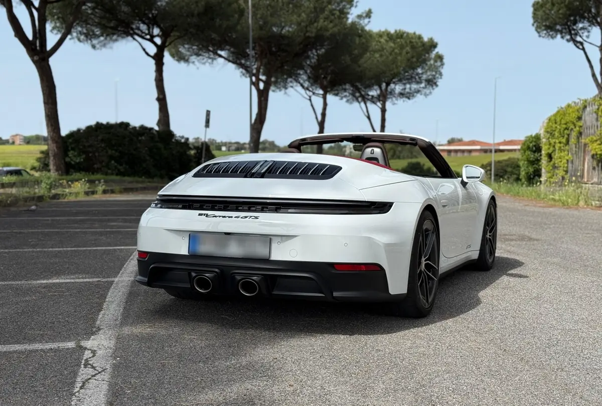 Porsche 992.2 Carrera 4 GTS Cabrio 2025, rear view — Venice Lux Car Rental, Venice. The 992.2 Carrera 4 GTS Cabrio pairs 540 hp with all-wheel drive, a combination that…