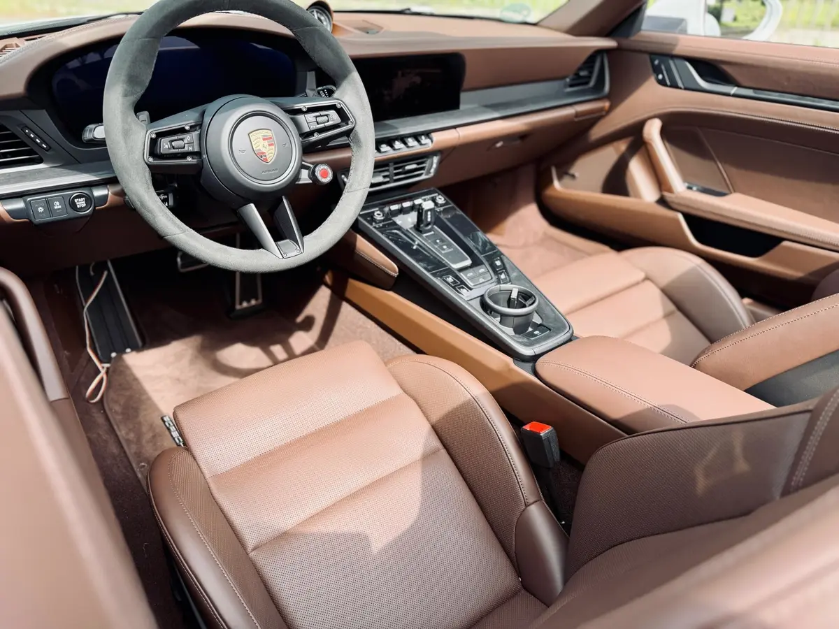 Porsche 992.2 Carrera 4 GTS Cabrio 2025, dashboard — Venice Lux Car Rental, Venice. The 992.2 Carrera 4 GTS Cabrio pairs 540 hp with all-wheel drive, a combination that…