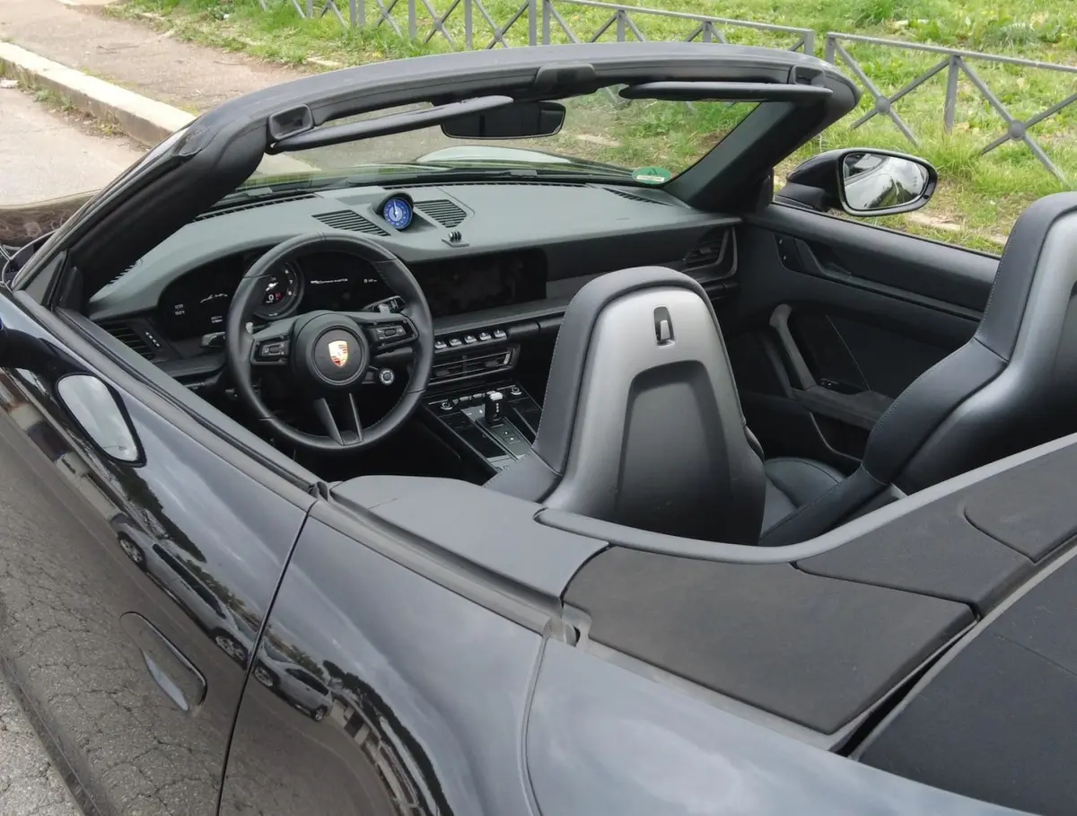 Porsche 992 Carrera 4 GTS Cabrio 2024, interior — Venice Lux Car Rental, Venice. The Porsche 992 Carrera 4 GTS Cabrio pairs 480 hp with all-wheel drive, a combination…