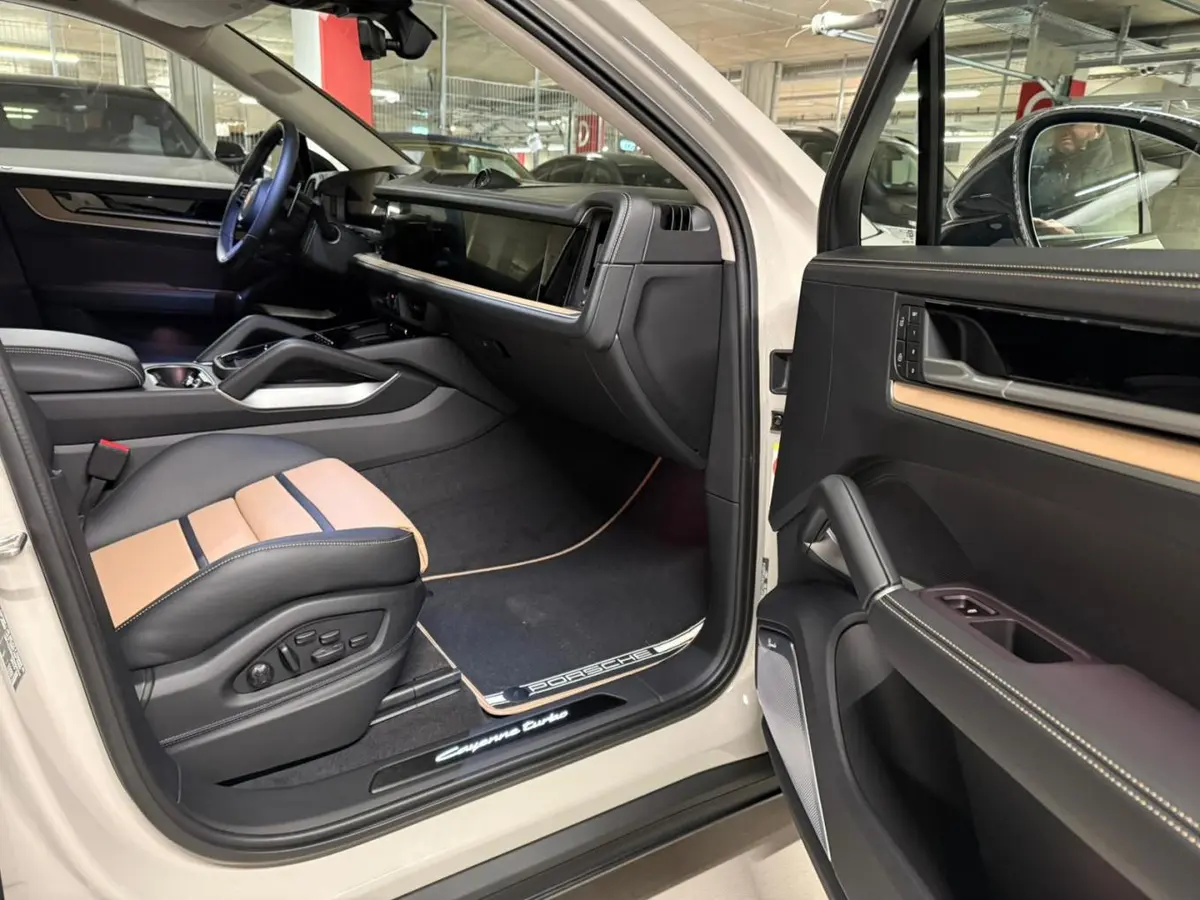 Porsche Cayenne Turbo E-Hybrid Coupé GT 2026, rear view — Venice Lux Car Rental, Venice. The Cayenne Turbo E-Hybrid Coupé GT pairs the everyday usability of a five-seat SUV with…